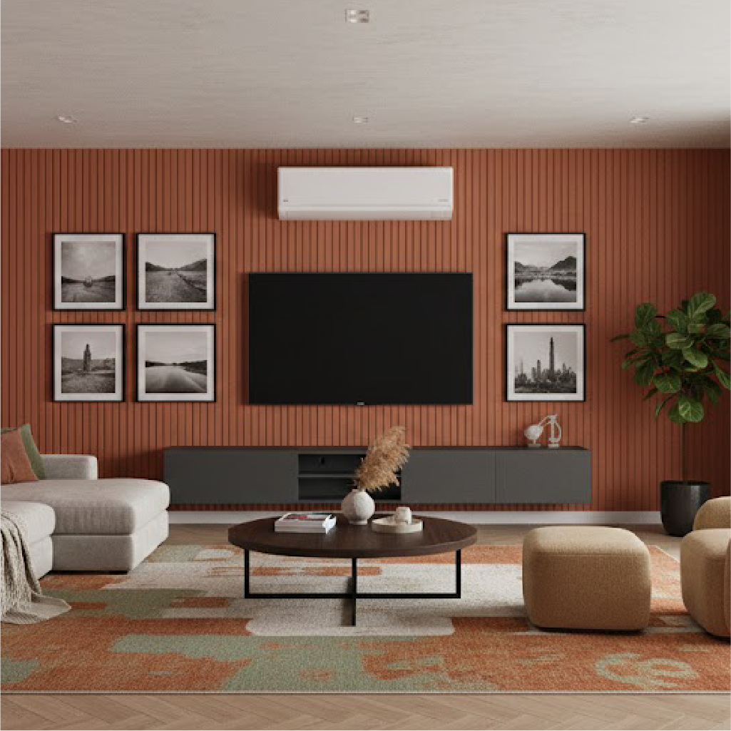 A modern living room with terracotta slat walls, a large TV, a grey sofa, and a white air conditioner mounted above the television.